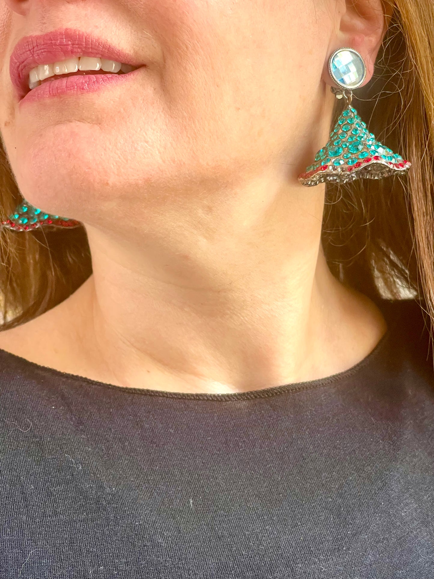 Worn by model Yves Saint Laurent Rive Gauche vintage statement earrings with turquoise and red rhinestones