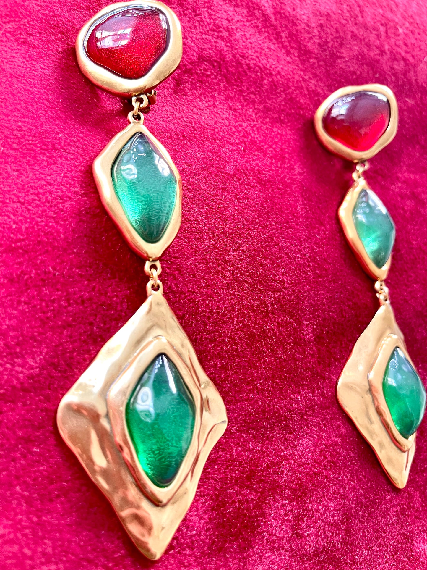 Glass stones copper metal on red velvet background Yves Saint Laurent style earrings