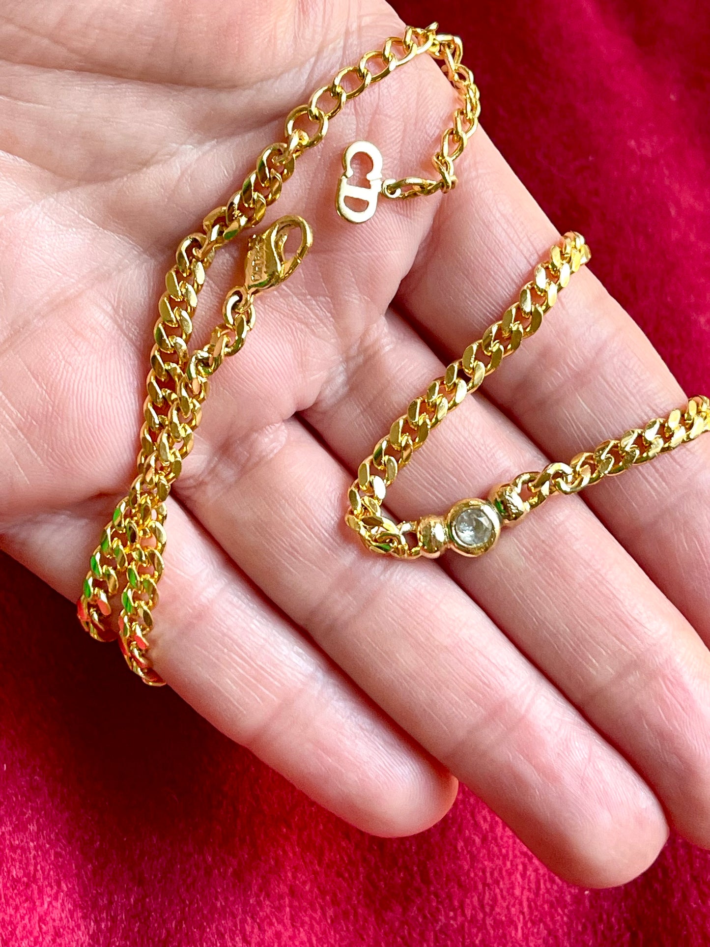 Bezel-set crystal centerpiece on vintage Dior 18K gold necklace