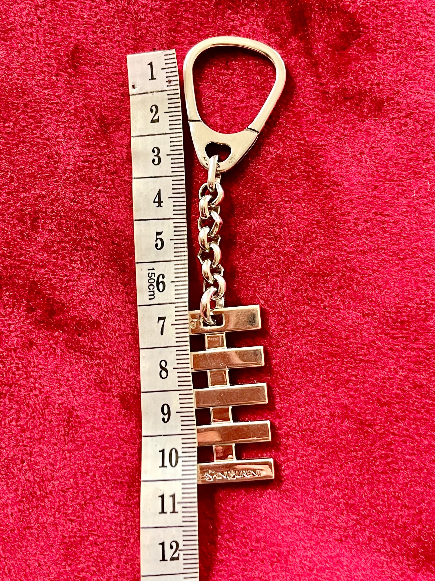 Using measuring tape Stamped 925 authentic accessories Yves Saint Laurent Vintage Sterling Silver keychain very good condition