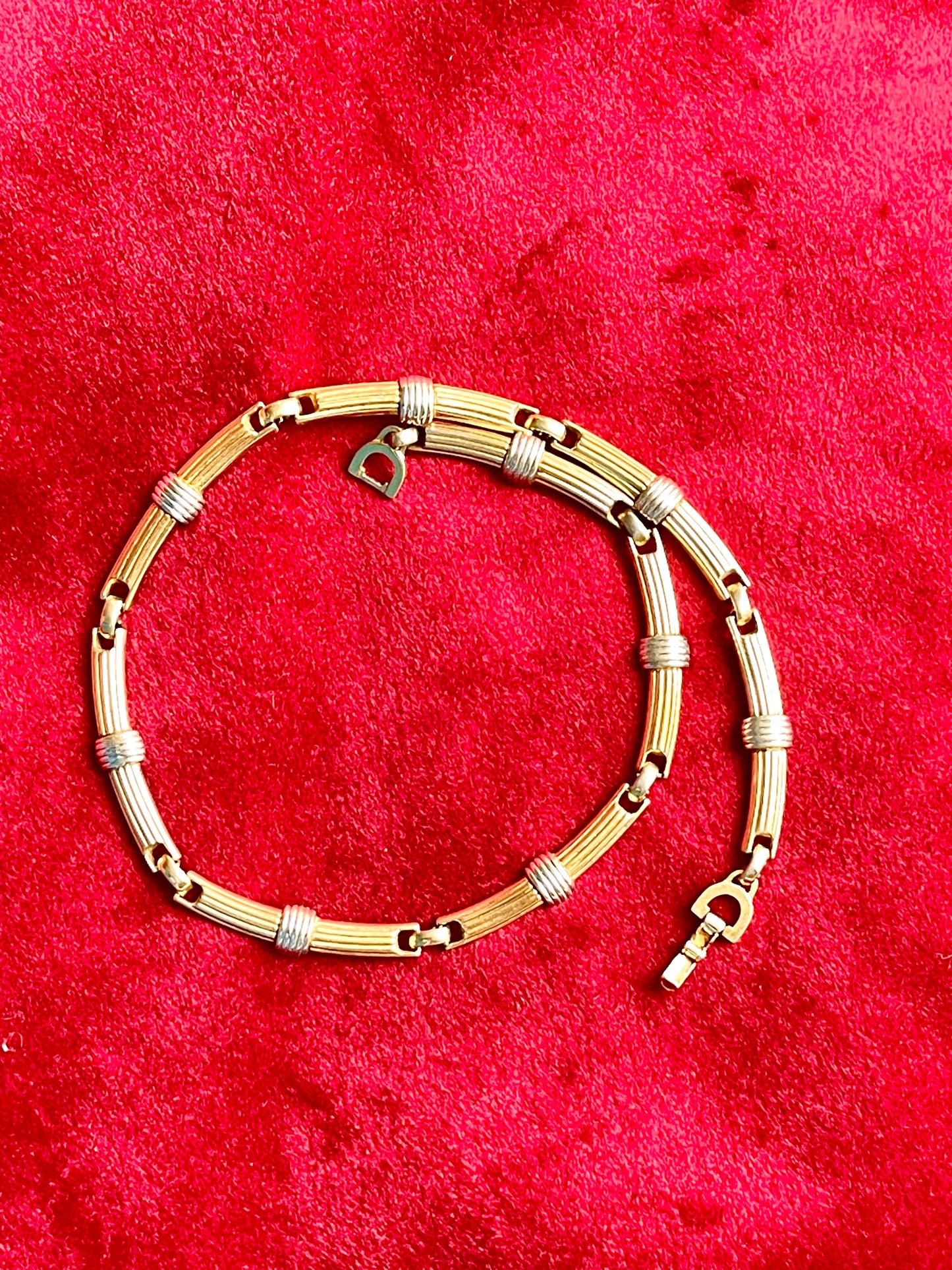Authentic vintage Christian Dior two-tone necklace featuring gold and silver-toned ribbed links. Timeless designer elegance perfect for any occasion.