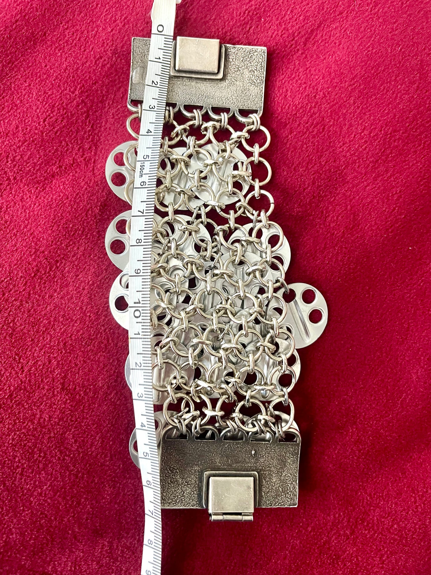 Approximately 17 cm length Paco Rabanne silver-tone statement bracelet details back view using a measuring tape