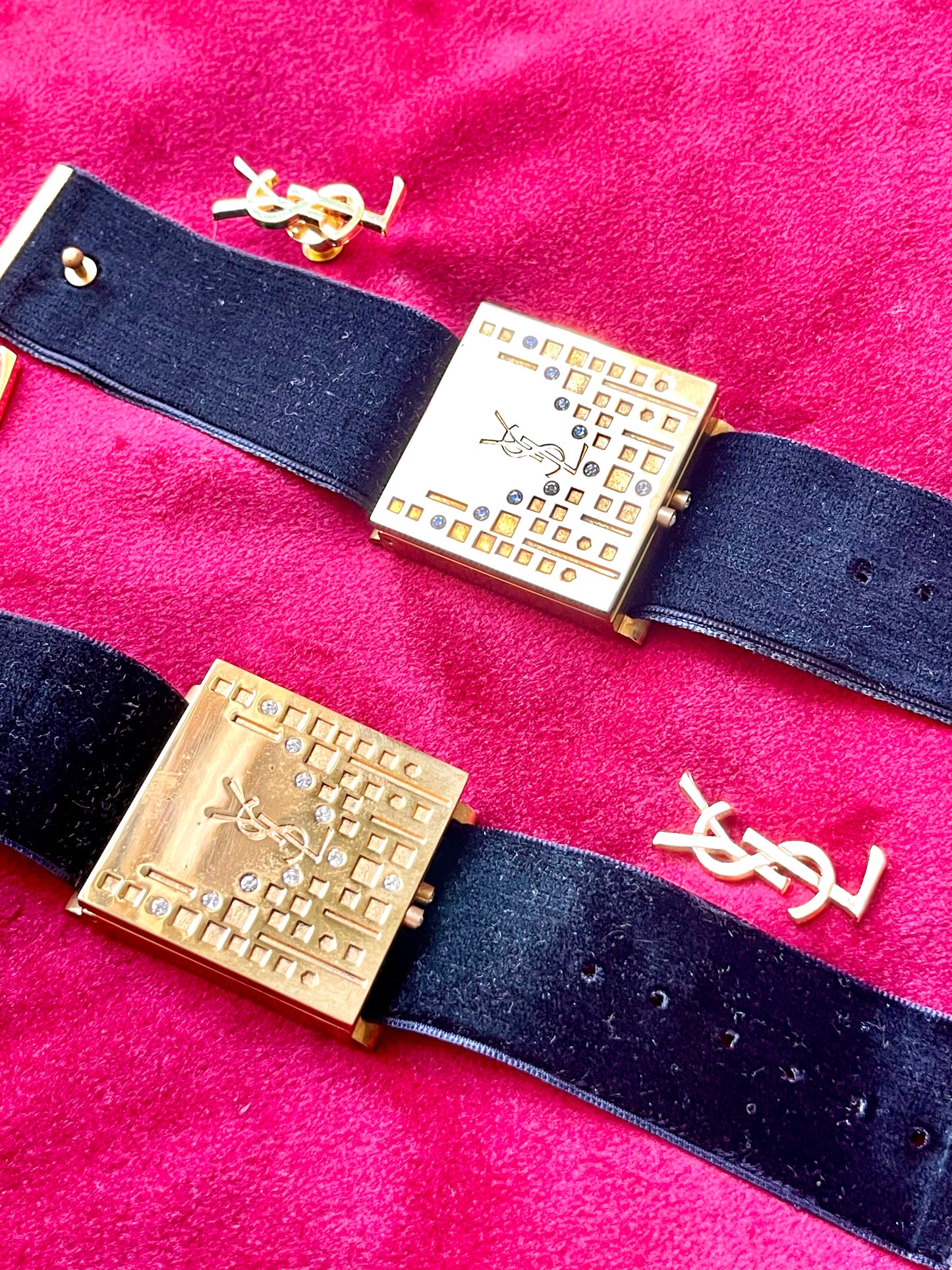 Side view Fashion Bracelet makeup Yves Saint Laurent vintage 2000 displayed with YSL pins on a red velvet background