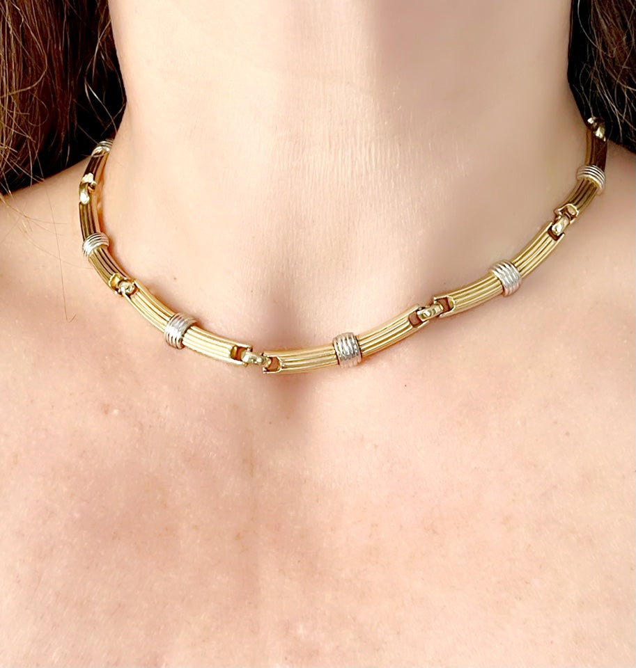 Vintage 80’s Dior two-tone necklace worn around the neck, showcasing its elegant designer style very good condition