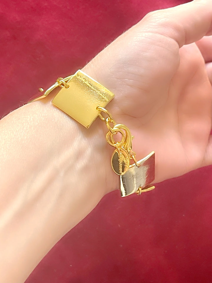 Back view Close up of Iconic Paco Rabanne vintage gold plated jewelry set , bracelet- necklace refurbished 18KG worn on model