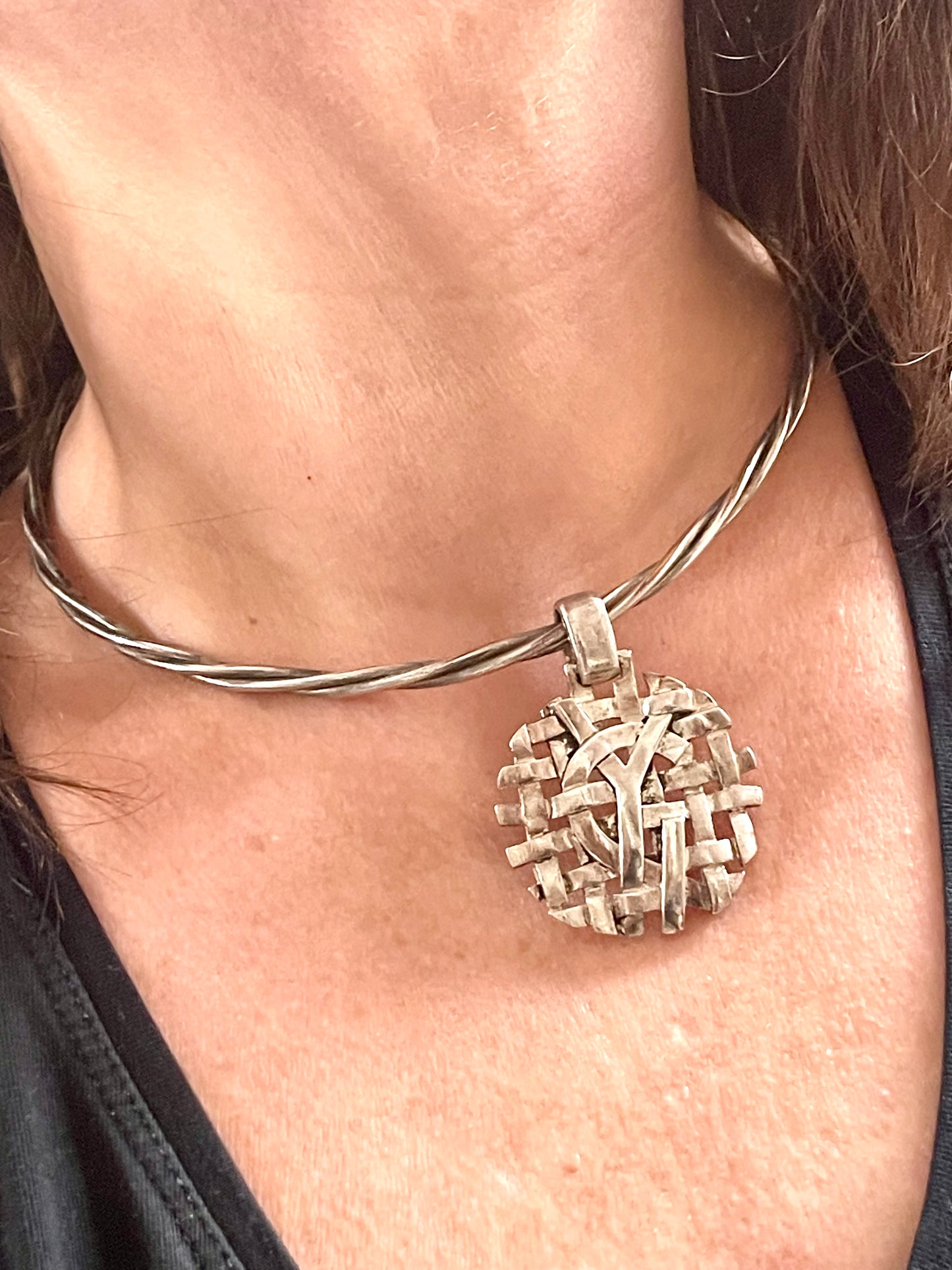 Yves Saint Laurent vintage silver ring pendant necklace worn by model
