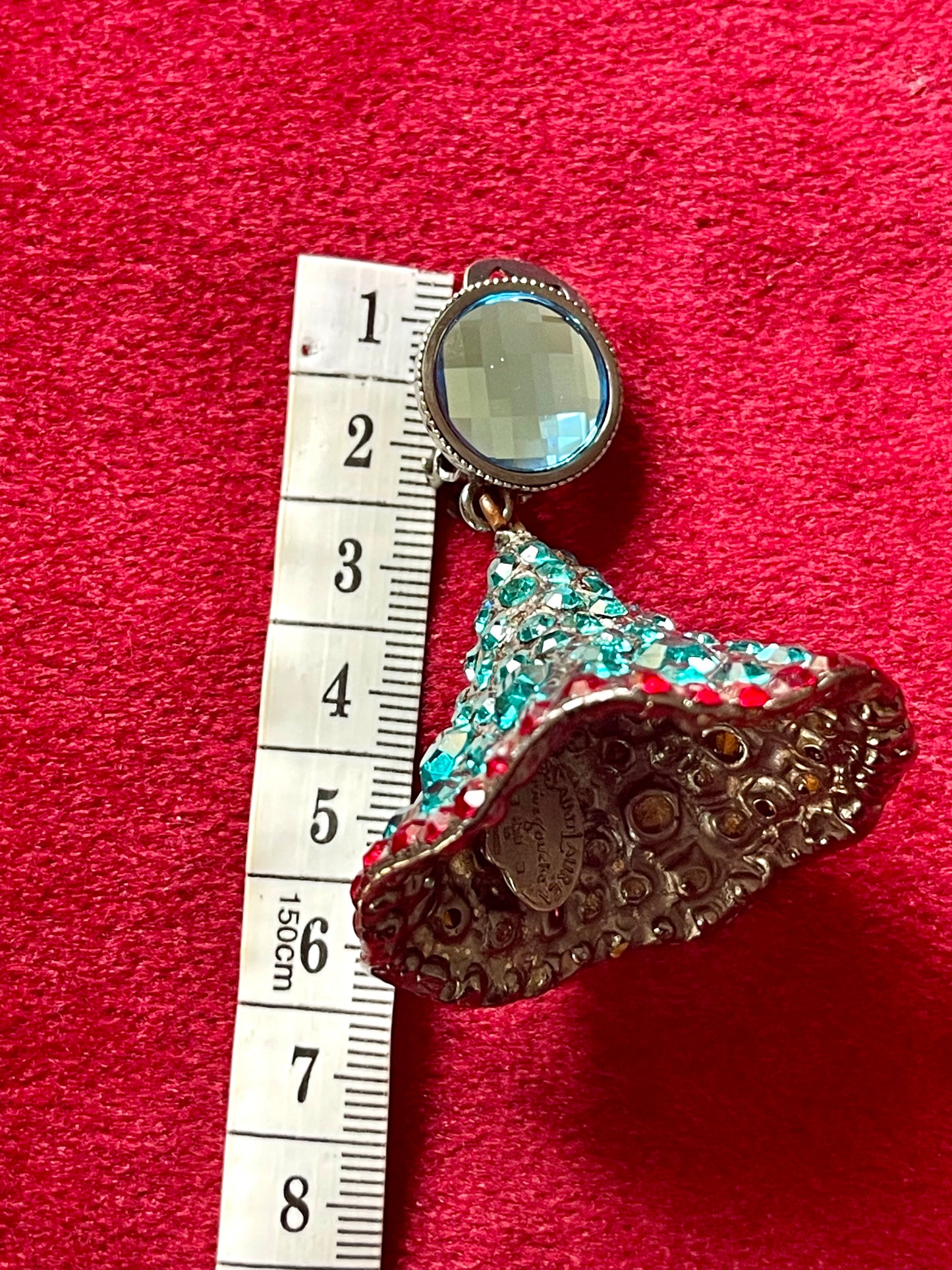 Rare Yves Saint Laurent Dome shape earrings showing the measurements of 6 cm