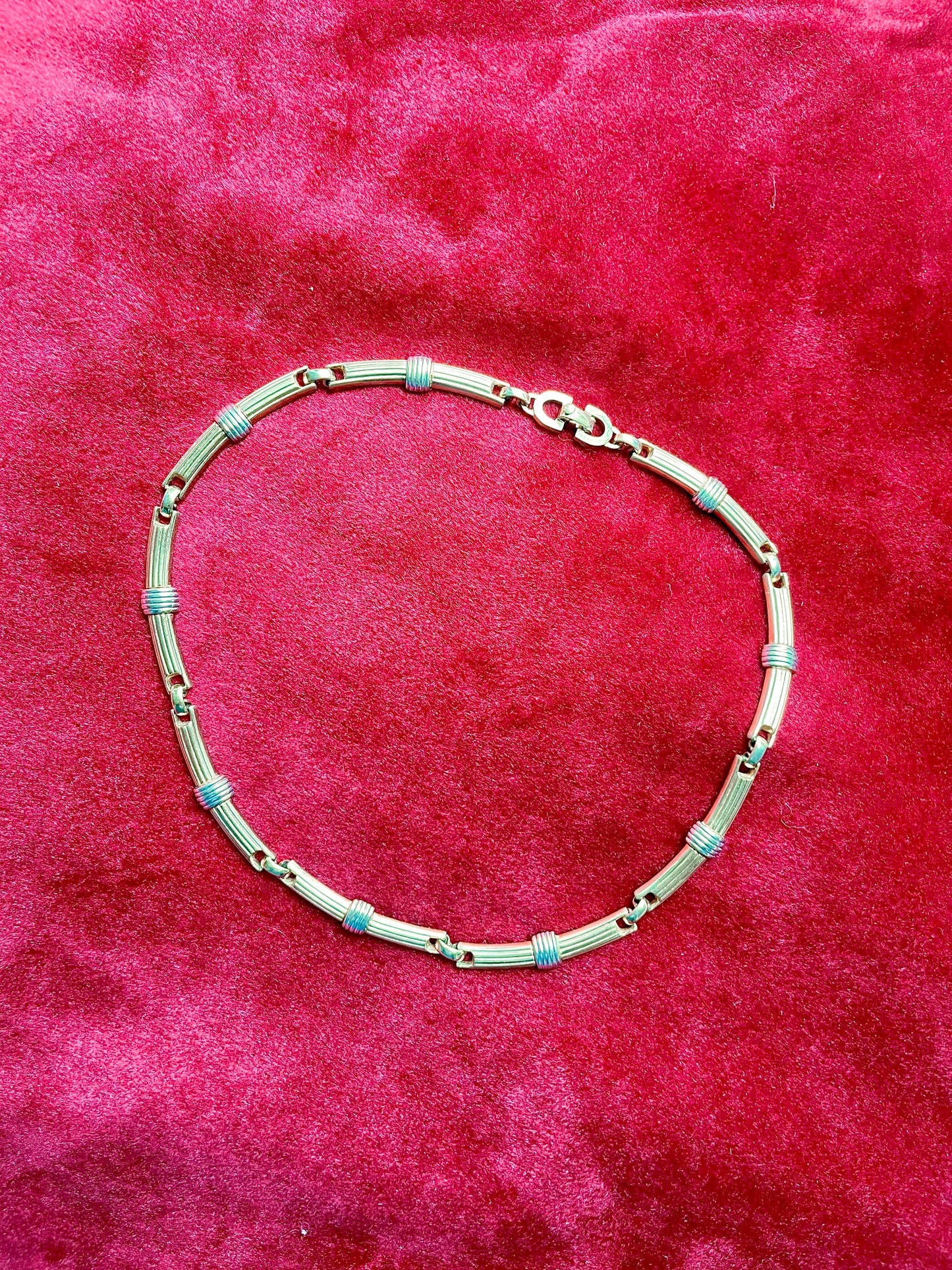 Authentic vintage Christian Dior two-tone necklace featuring gold and silver-toned ribbed links. Timeless designer elegance perfect for any occasion.