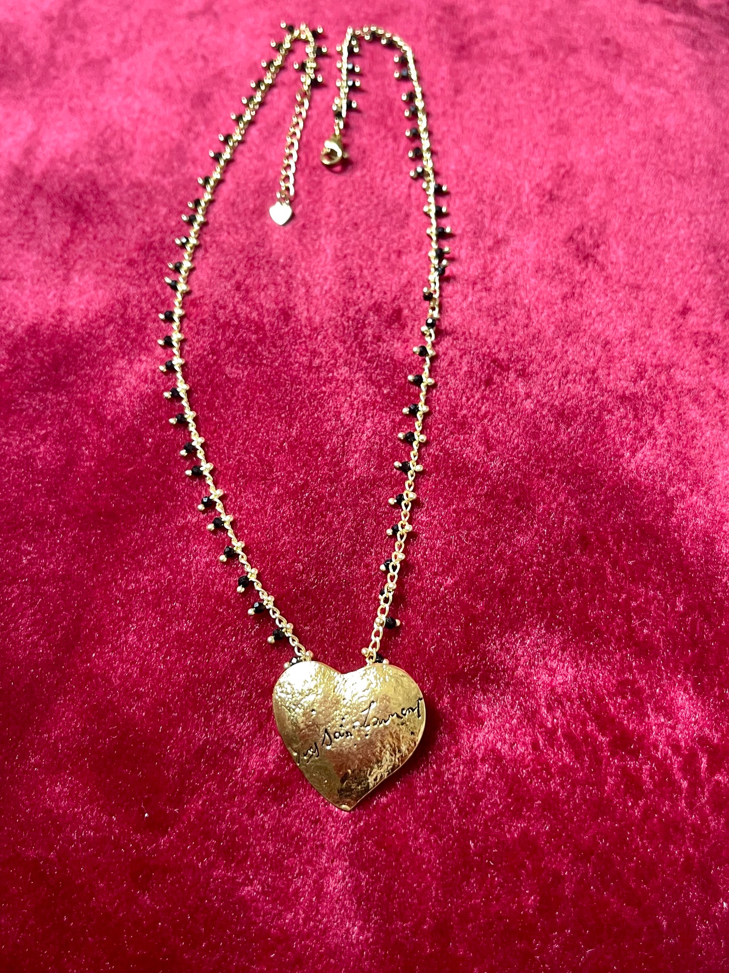 Yves Saint Laurent golden heart pendant