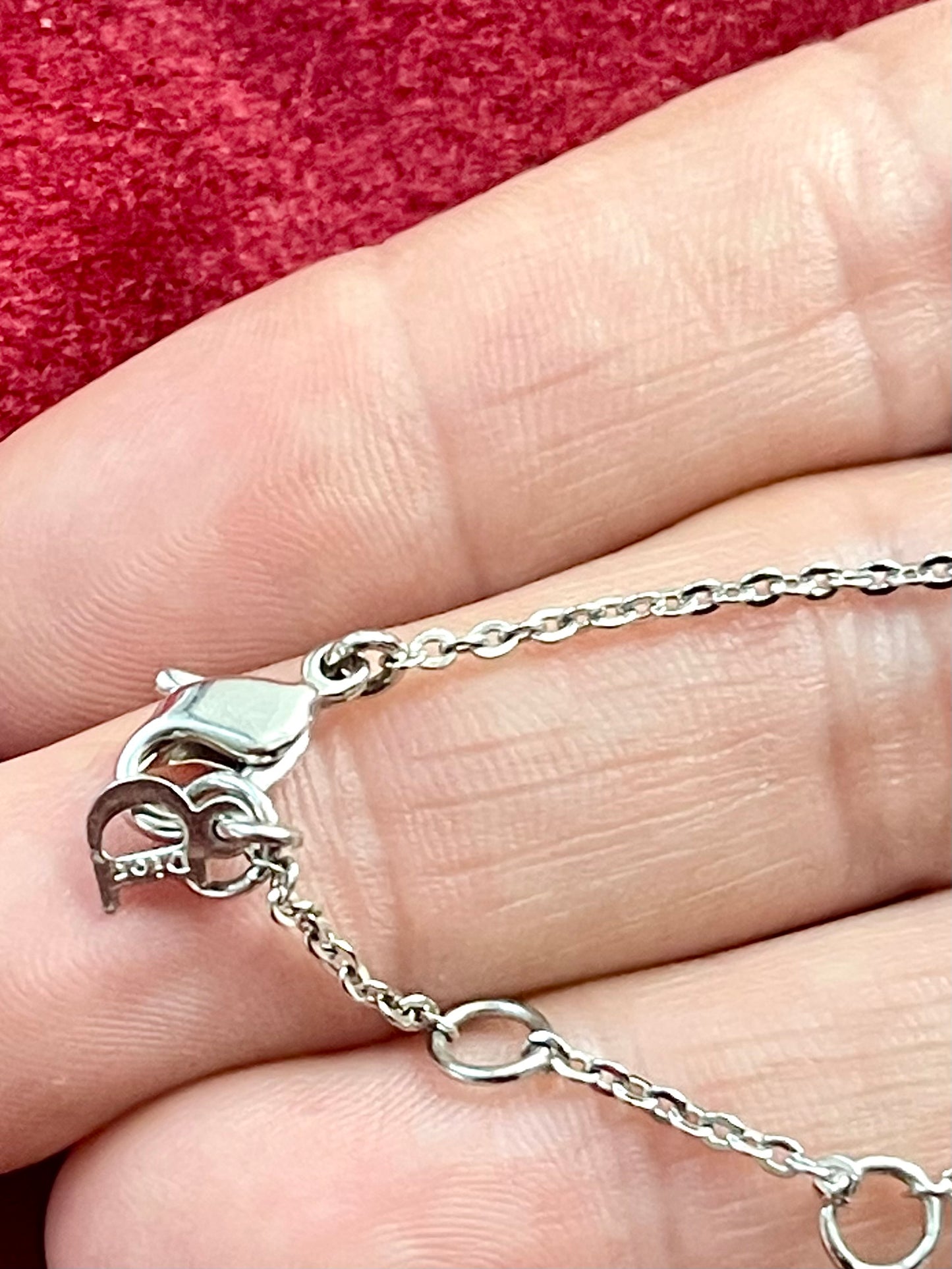 Bracelet authentique Dior vintage argenté avec breloque cœur et perles roses