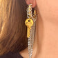 Pendientes de aro Funky modificados con llaves doradas vintage de Saint Laurent