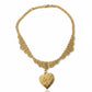 Vintage Refurbished 18KG Yves Saint Laurent 80s pendant Monet gold necklace displayed on white background 