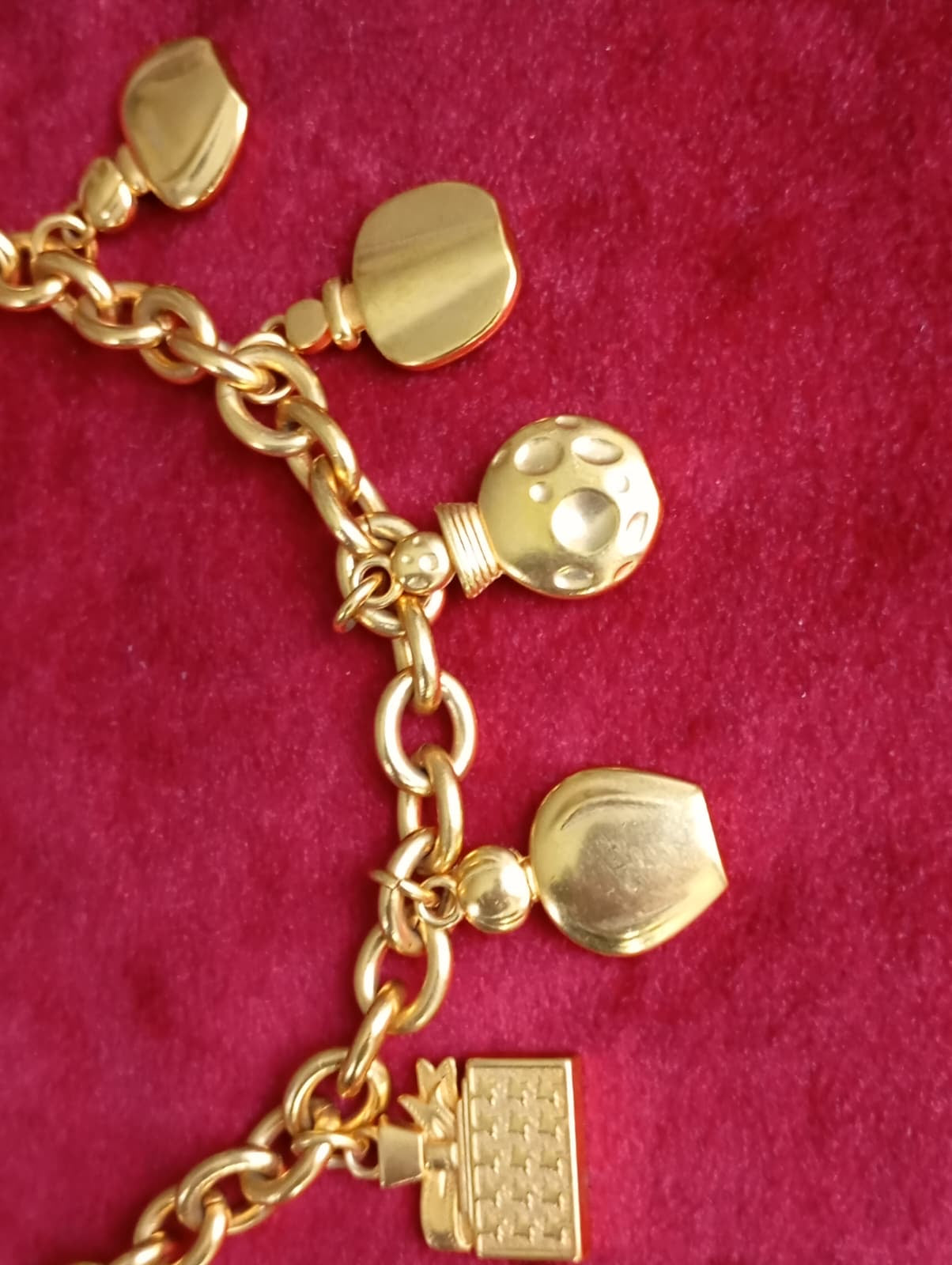 Side view of Dior charm bracelet highlighting adjustable fit