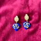 Boucles d'oreilles vintage Yves Saint Laurent Coeurs bleus ton or