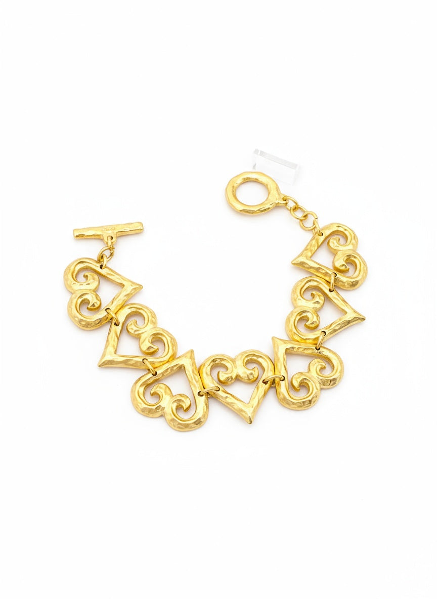 Authentic Vintage 90s Yves Saint Laurent heart charms gold bracelet rare find collectible item signed 