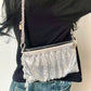 Worn by model on the shoulder One of a kind handmade Paco Rabanne repurposed silver pixel mesh bag