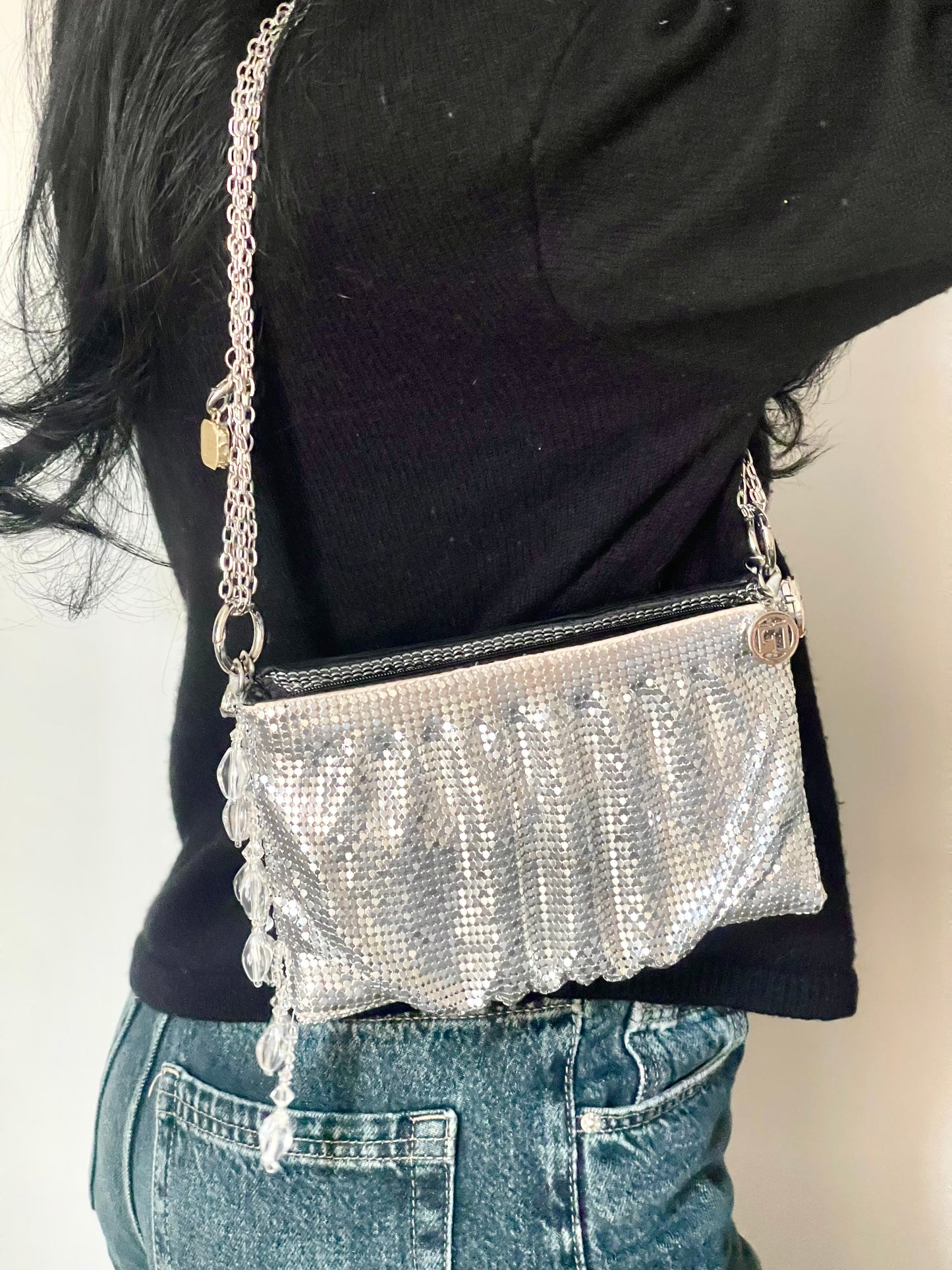Worn by model on the shoulder One of a kind handmade Paco Rabanne repurposed silver pixel mesh bag