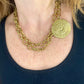 Alternative style Yves Saint Laurent vintage scarf holder Gold chain necklace worn by model 
