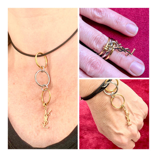 Yves Saint Laurent authentic charm as a ring pendant and bracelet with magnetic black cord , three different styles use 
