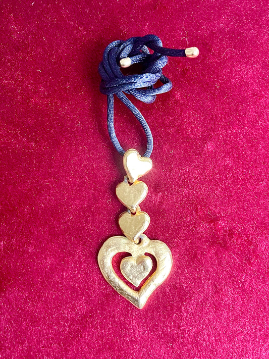 Four Hearts Pendant Vintage Yves Saint Laurent Old Gold Color Pendant With Original Black Satin Cord .