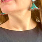 Worn by model Yves Saint Laurent Rive Gauche vintage statement earrings with turquoise and red rhinestones 