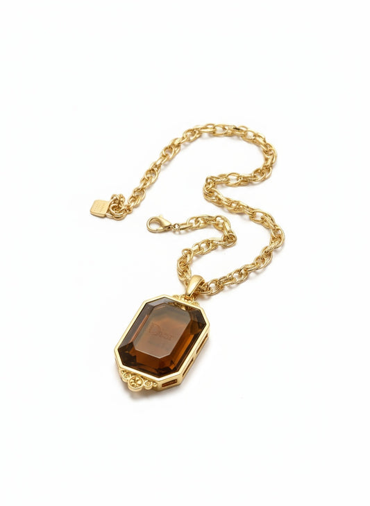 Golden Dior couture vintage pendant necklace with amber gem and Dior engraving on 