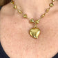 Back view Vintage YSL rhinestone heart pendant necklace worn by model showing size and gold chain detail, Valentine's Day gift