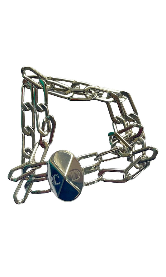 A vintage 80's Gourmet Dior bracelet refurbished with white gold , The bracelet appears to have a metallic clasp and chain links.