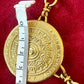 4 cm Yves Saint Laurent vintage scarf holder Gold tone on red fabric using a measuring tape 
