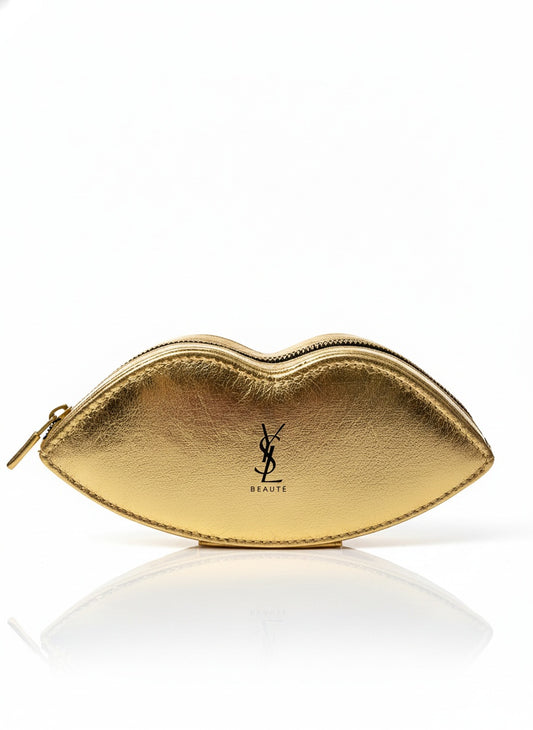 Gold lip-shaped makeup bag with YSL logo on a white background
