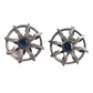 Vintage Paco Rabanne sun-design earrings in silver tone with black faceted stones, shown against a white background.