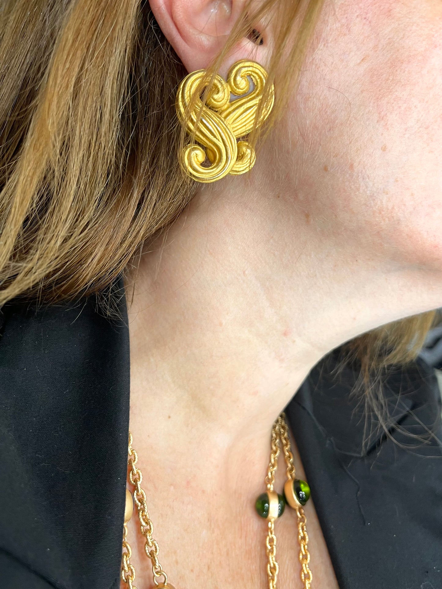 Vintage Nina Ricci statement heart earrings shown worn for scale