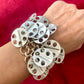 Close up Designer vintage Paco Rabanne bracelet on wrist