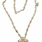 gold tone cross yves saint laurent necklace statement piece