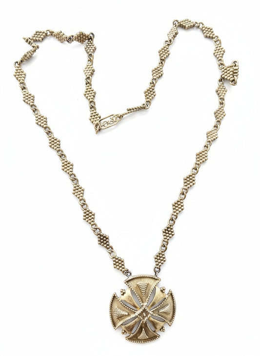 gold tone cross yves saint laurent necklace statement piece
