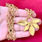 Chocker necklace Vintage 80’s Yves Saint Laurent Leaf Pendant authentic worn by model versatile adjustable design 