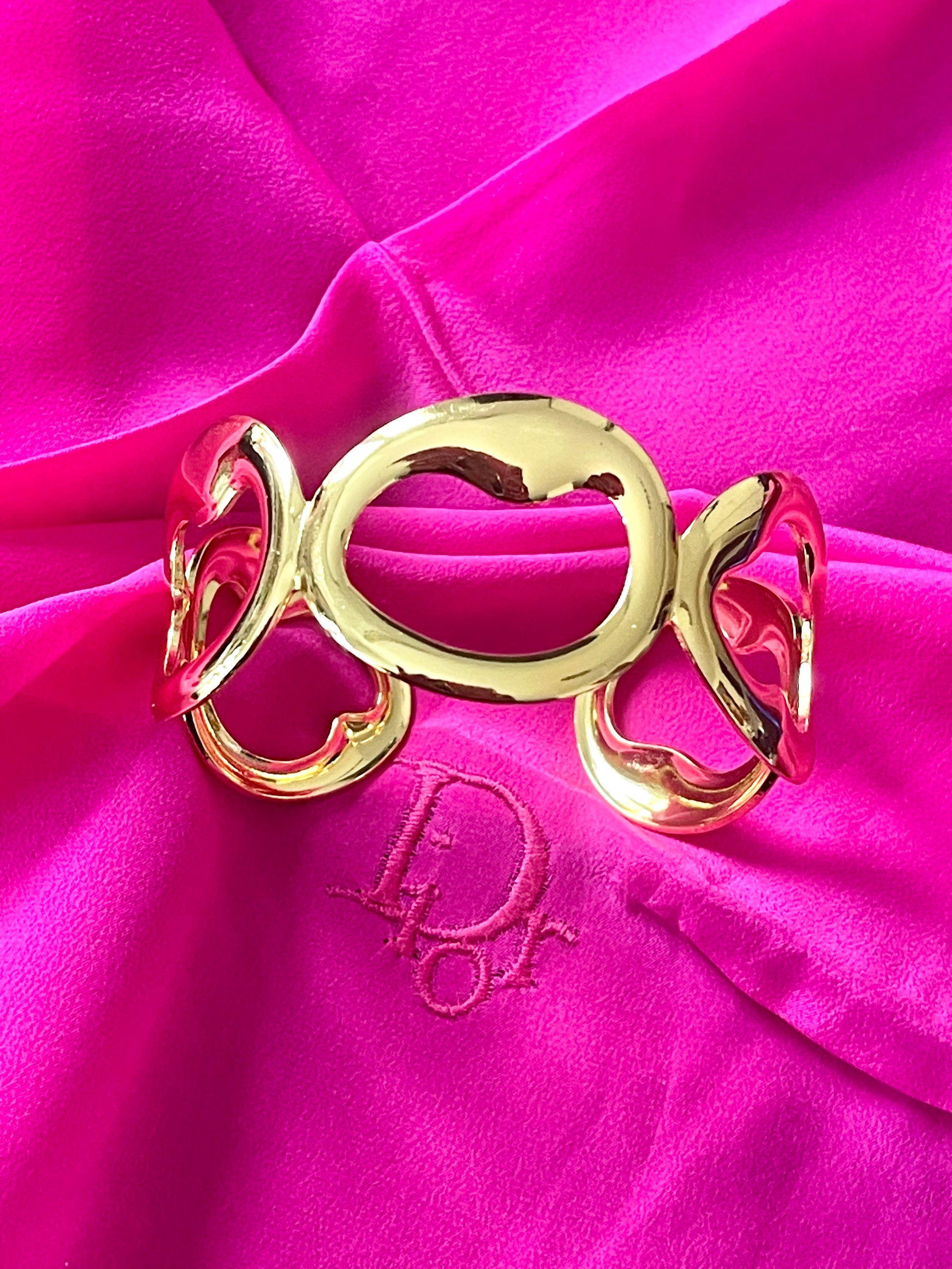 Dior vintage silk scarf and gold bracelet shown separately upper view 