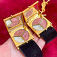 Inside view of mirror and makeup Fashion Bracelet makeup Yves Saint Laurent vintage 2000 on a red velvet background 