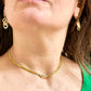 Vintage Christian Dior necklace worn, showcasing elegant gold chain and crystal detail