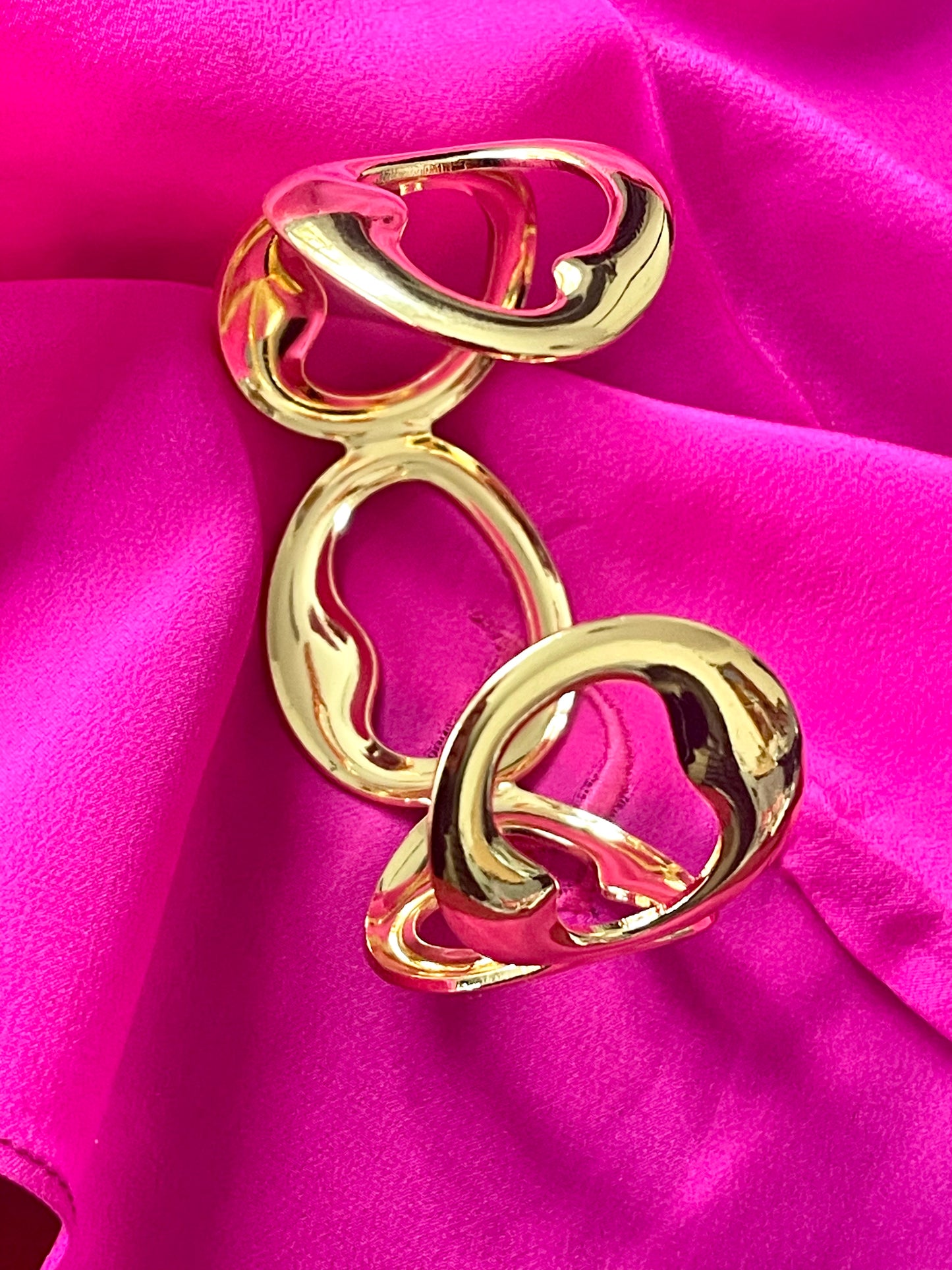 Back side view of Dior vintage silk scarf and gold bracelet shown separately