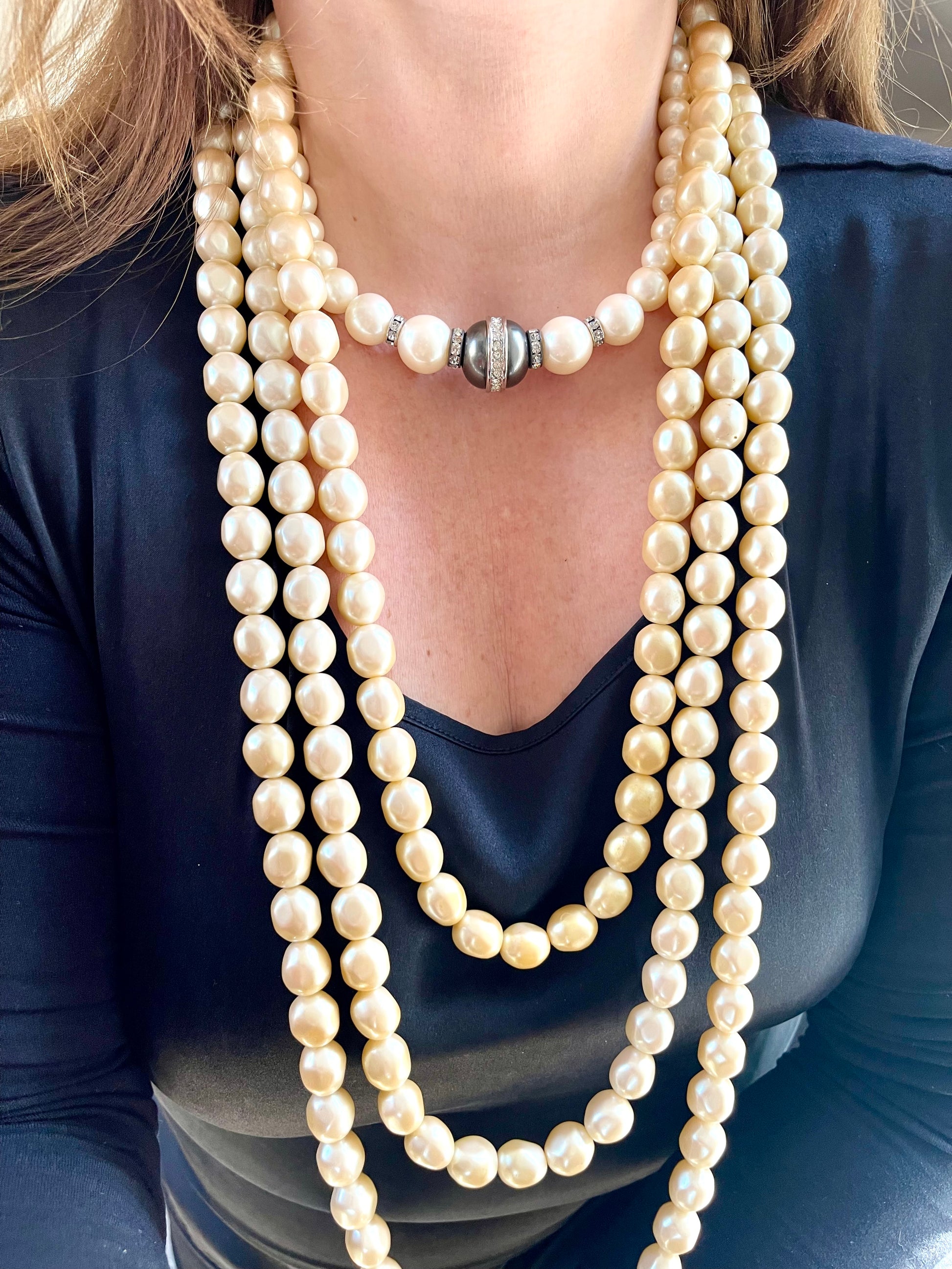 Yves Saint Laurent Vintage classic Faux Pearl Necklace grey white worn by model associated with a pearl necklace 