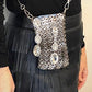 Phone holder silver metal Crystal crossbody bag style Paco Rabanne Sparkle 1969 worn by model 