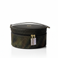 Round black Dior  travel case with gold accents on a white background