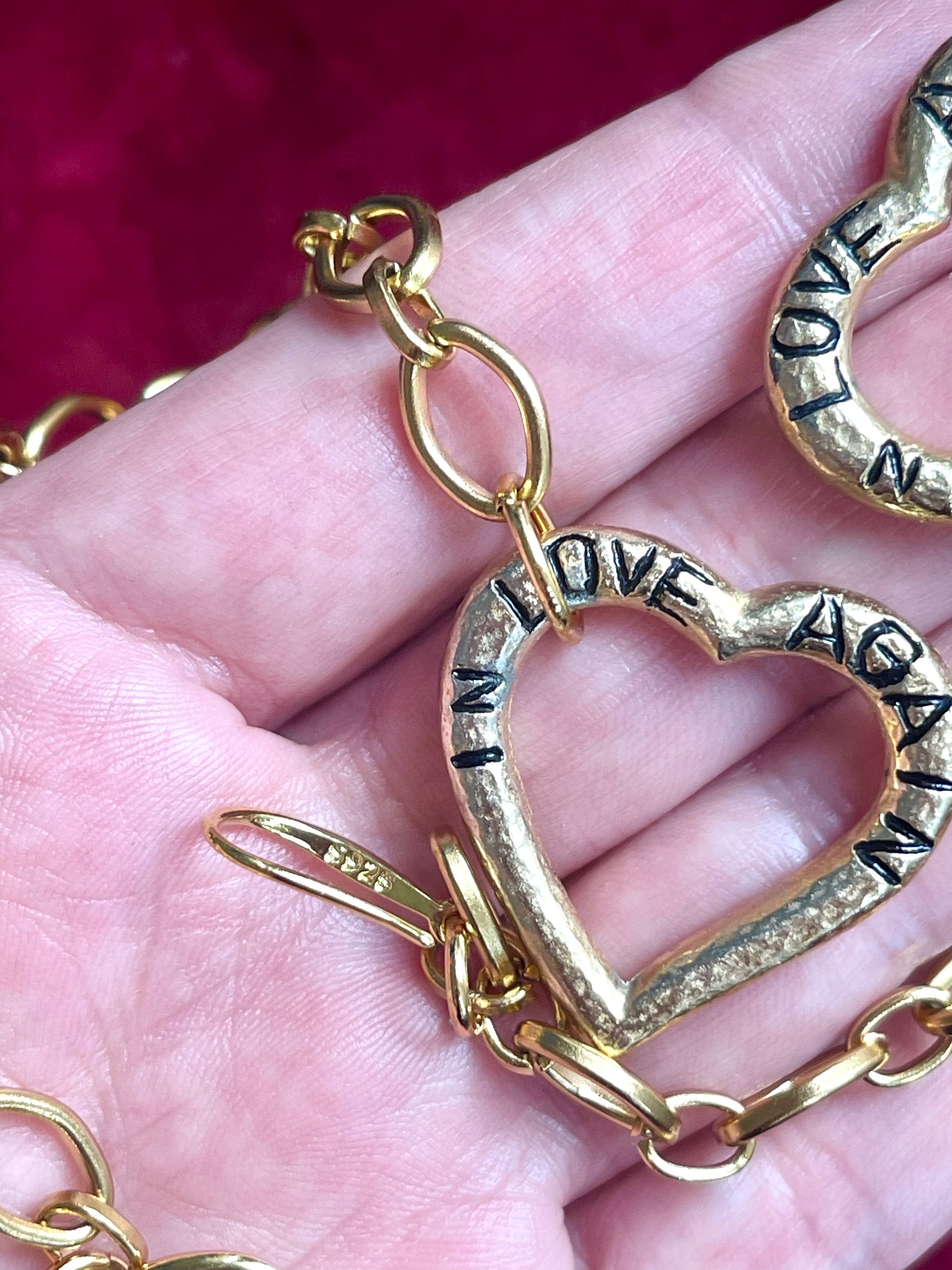 Back of YSL earrings, S925 gold-plated hoops visible