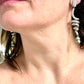 Grossé Dior earrings worn, showcasing elegant drop design and pearl detail