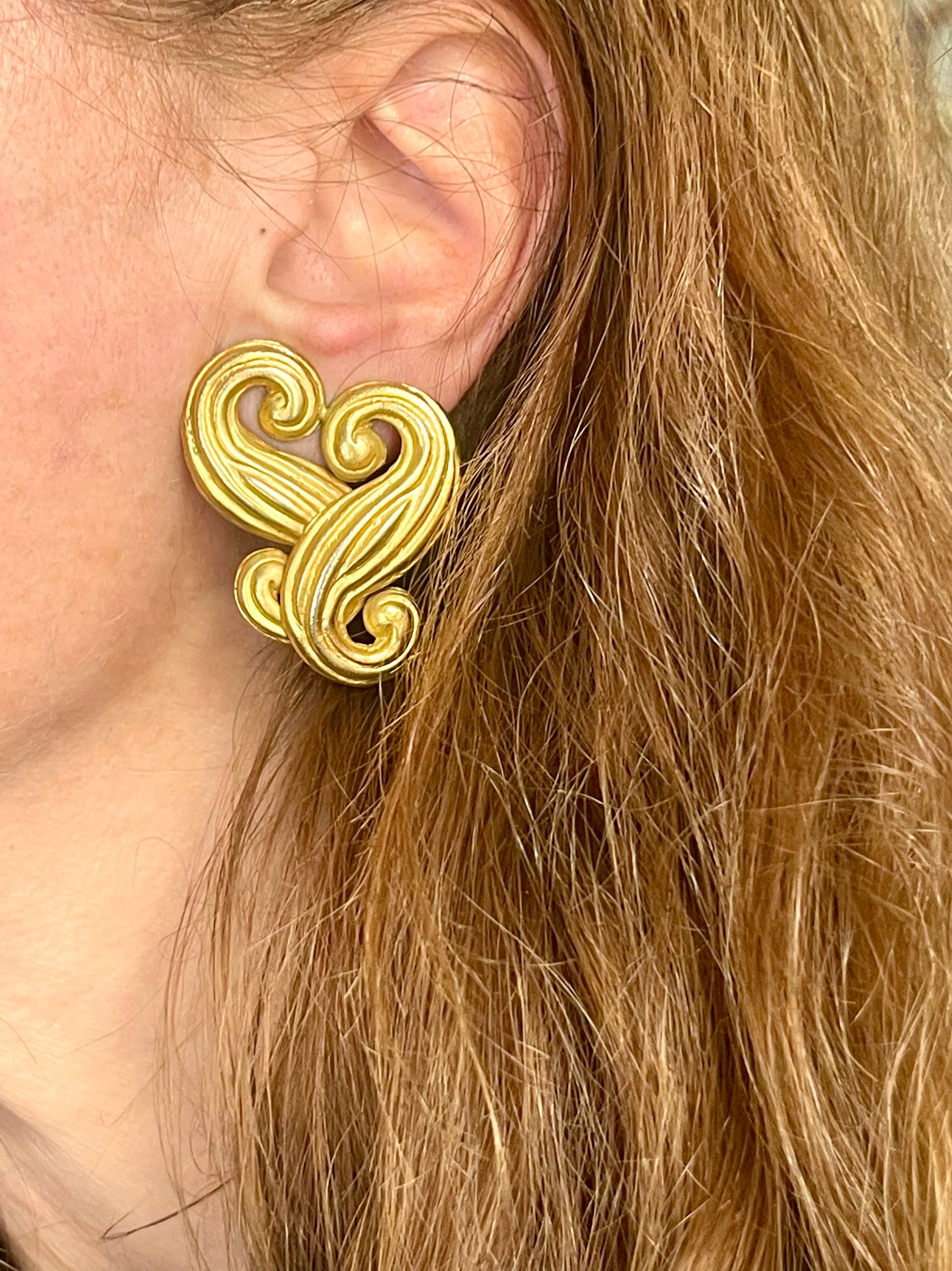 Vintage Nina Ricci statement heart earrings shown worn for scale By model 