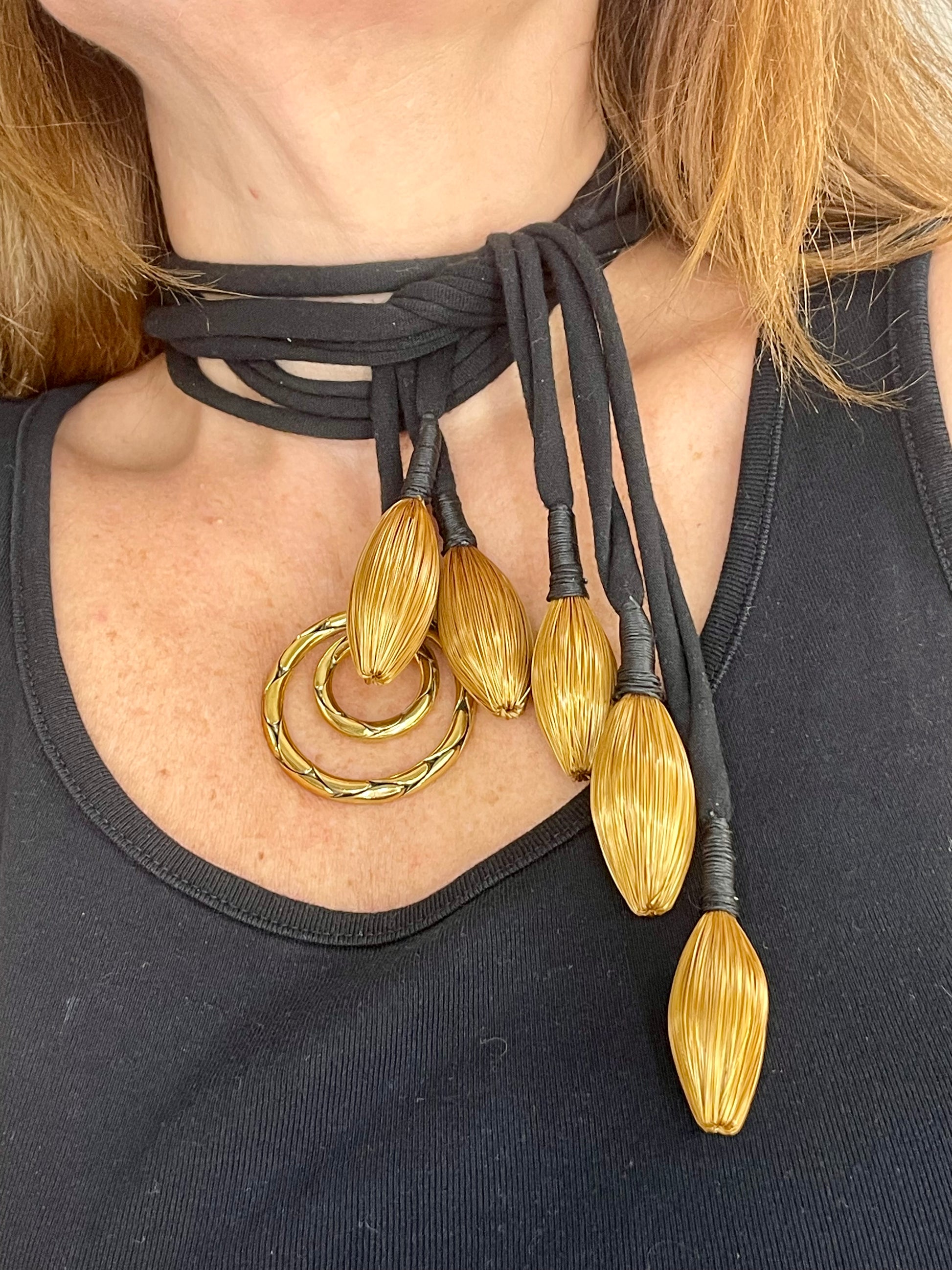 Vintage Yves Saint Laurent YSL scarf holder worn as a one of a kind art textile statement necklace