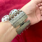 Worn on hand Vintage silver-tone Paco Rabanne bracelet clasp detail