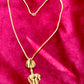 Gold-tone vintage Yves Saint Laurent necklace. The pendant features two textured, sculptural heart-shaped elements in a brushed gold finish, connected vertically for an artistic vintage look