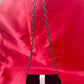 Clutch vintage modificado con broche de Yves Saint Laurent